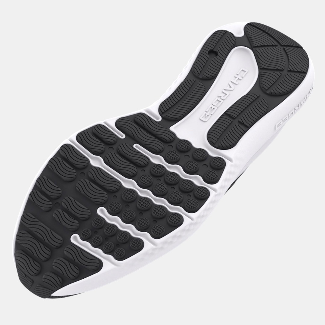 Detailed view of a sports shoe sole featuring intricate tread patterns and cushioning elements.